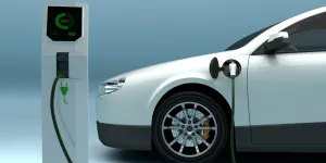 Et billede af en elbil der bliver opladet